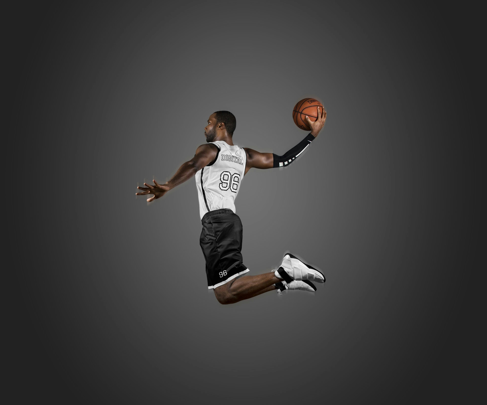 basketball player jumping to shoot